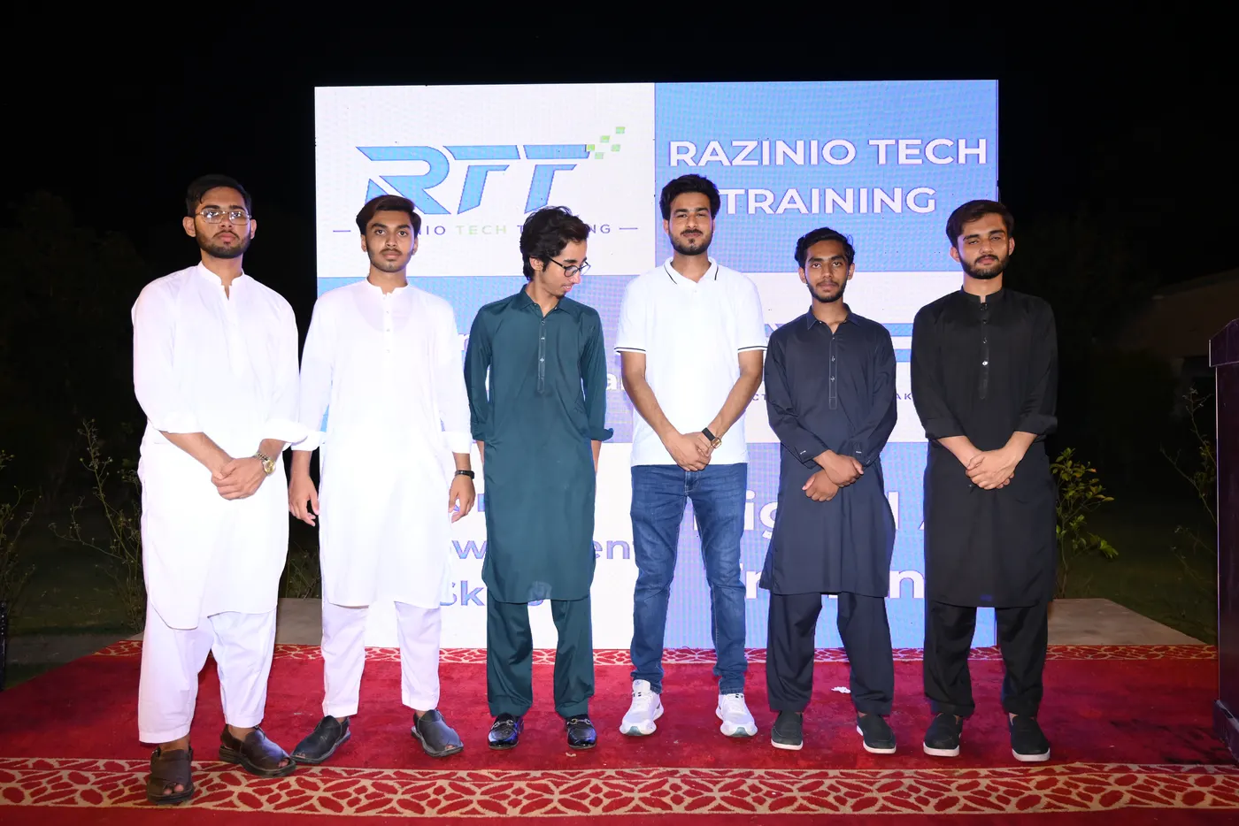 RTT students with their teachers at Razinio Tech Training